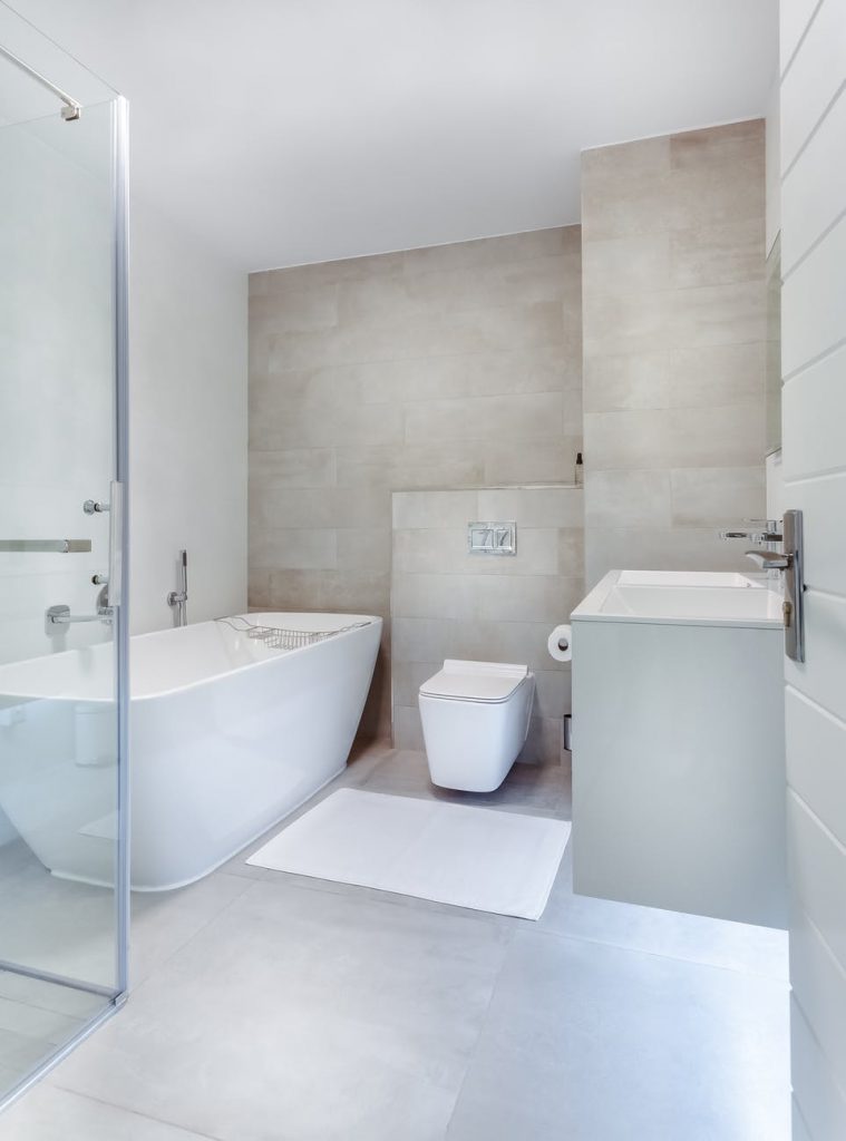 designing a modern bathroom - shower, bath, toilet and sink