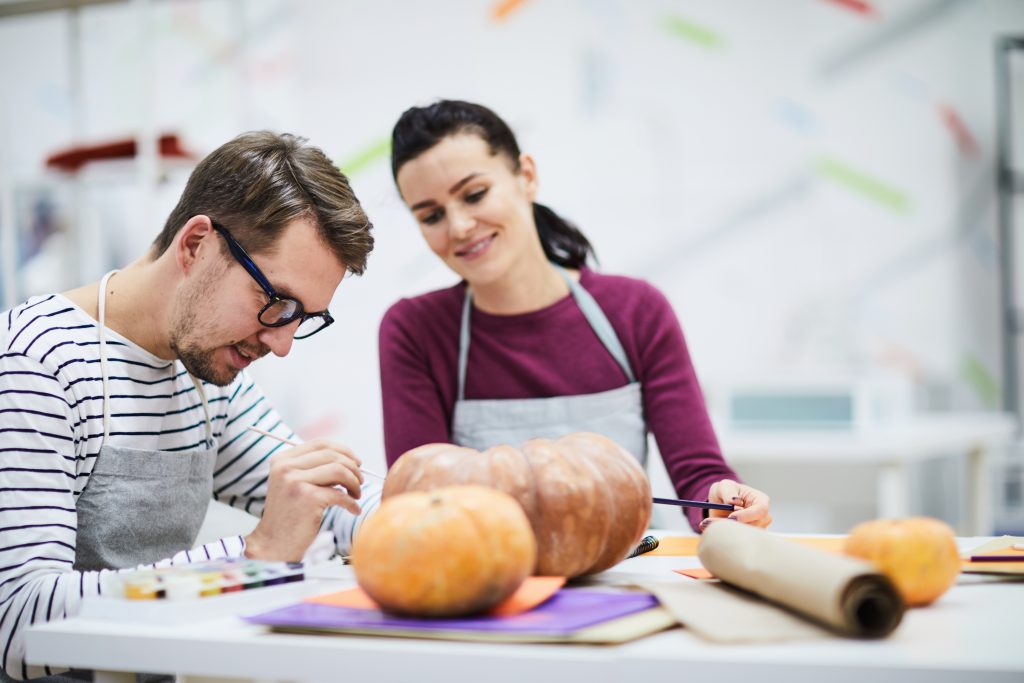 A couple, pumpkin carving... Tips For Dating In Autumn