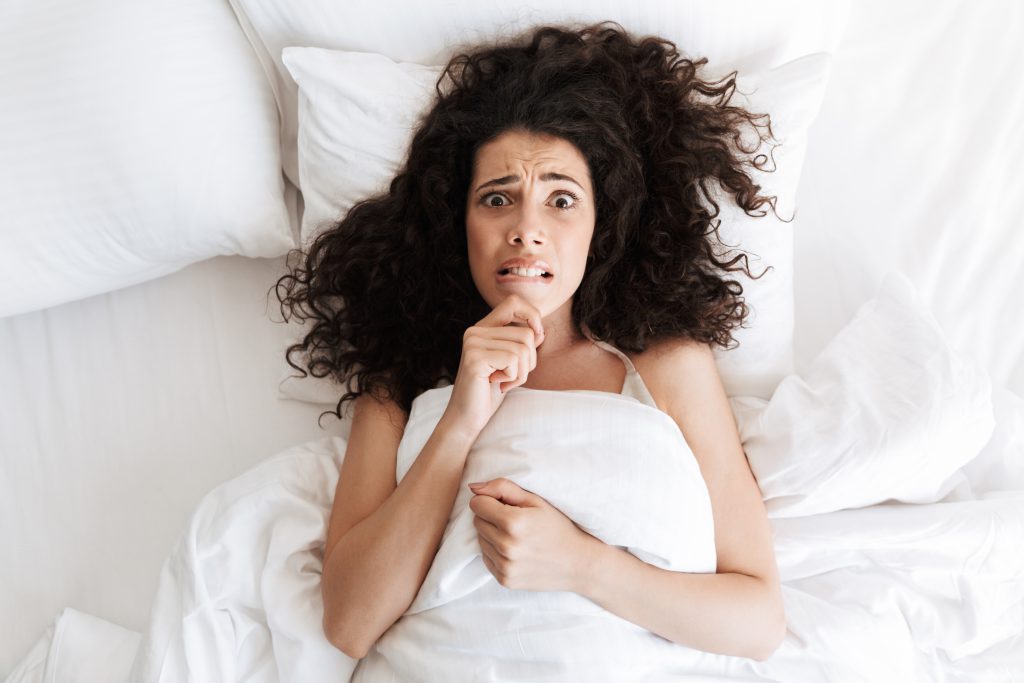 woman looking confused after doing the This or That Quiz