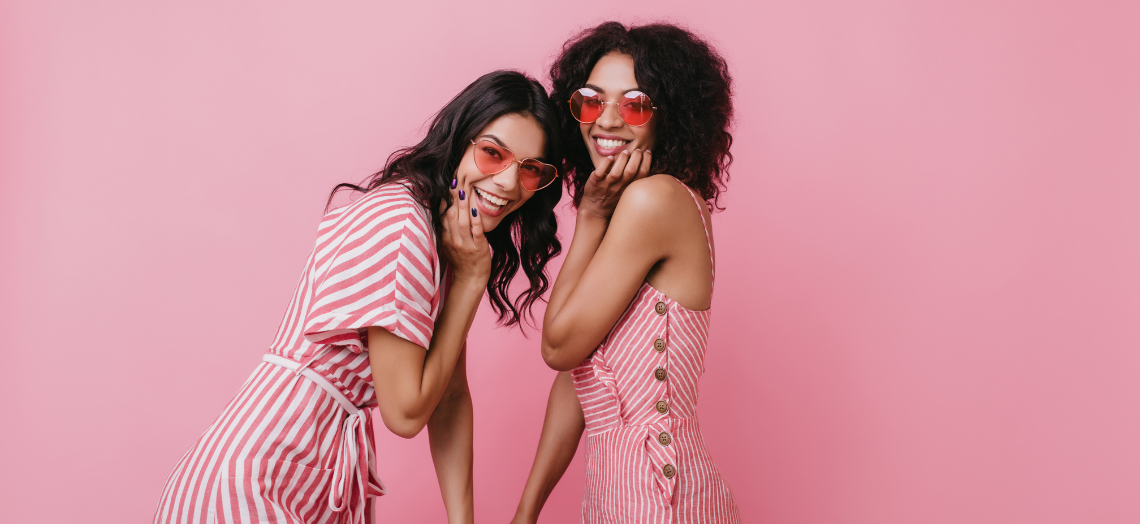 two girls having a pink photoshoot